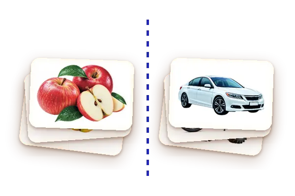 Two piles of cards: food on one side, vehicles on the other